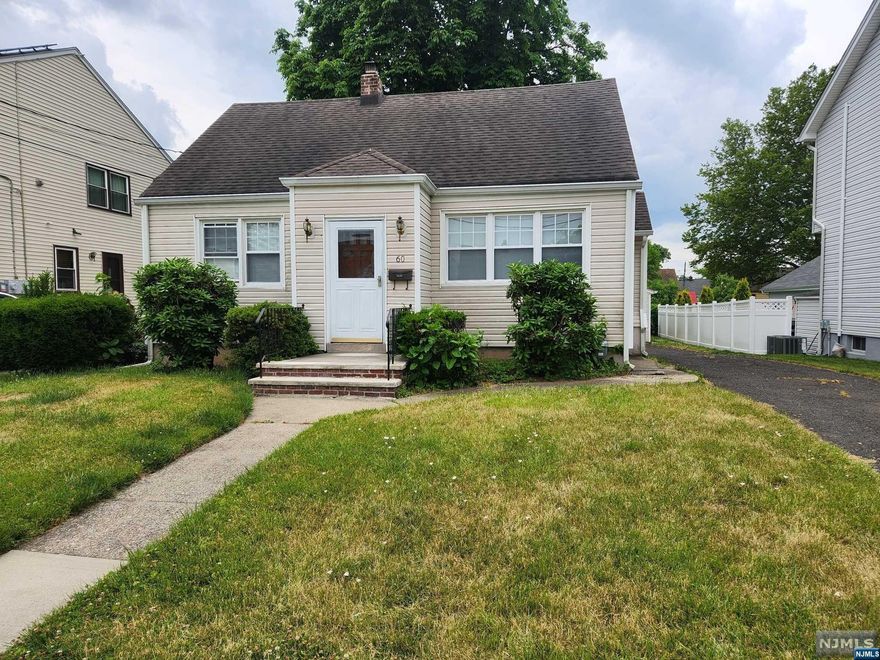 Welcome to this charming cape cod located in a prime neighborhood in Garfield. House offers 4 bedrooms, 2 full bathrooms, eat-in kitchen and living room. Additionally a basement with laundry area and plenty of storage space. Back exit from the kitchen will lead you to a fenced yard and patio. The home also features a detached garage and a 3 car driveway. To note that there is an active oil tank in basement. Don't miss the opportunity! Schedule a showing today!