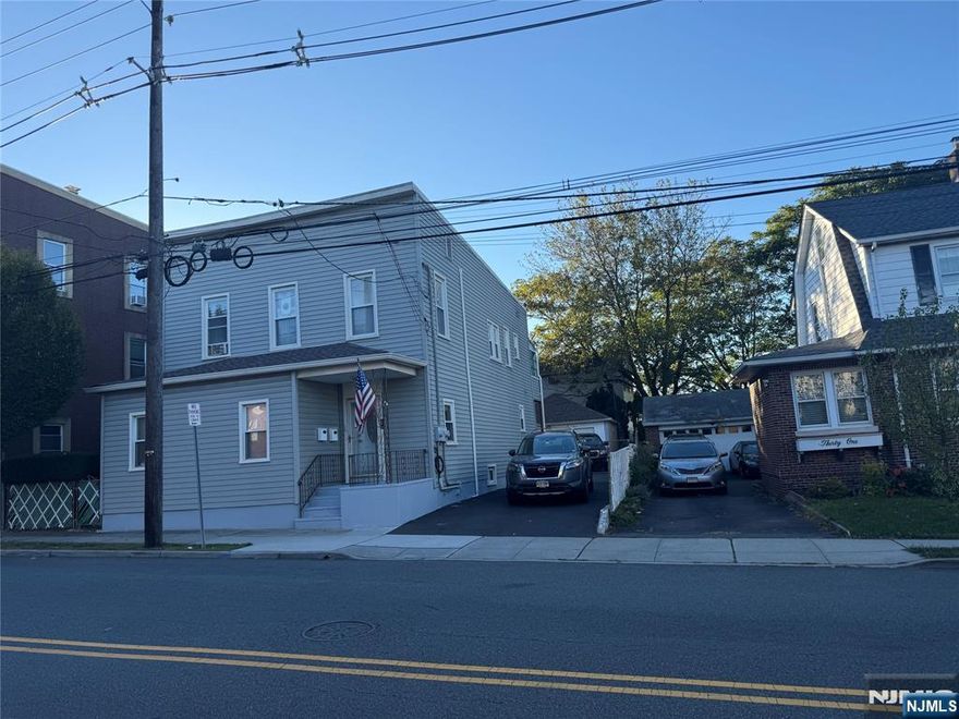 Welcome to this beautiful two-family home, featuring a newly renovated living room that spans all floors, along with an additional new full bathroom in the basement. Furthermore, there are two separate laundry rooms in the basement. The location is near shops, restaurants, and the highways.