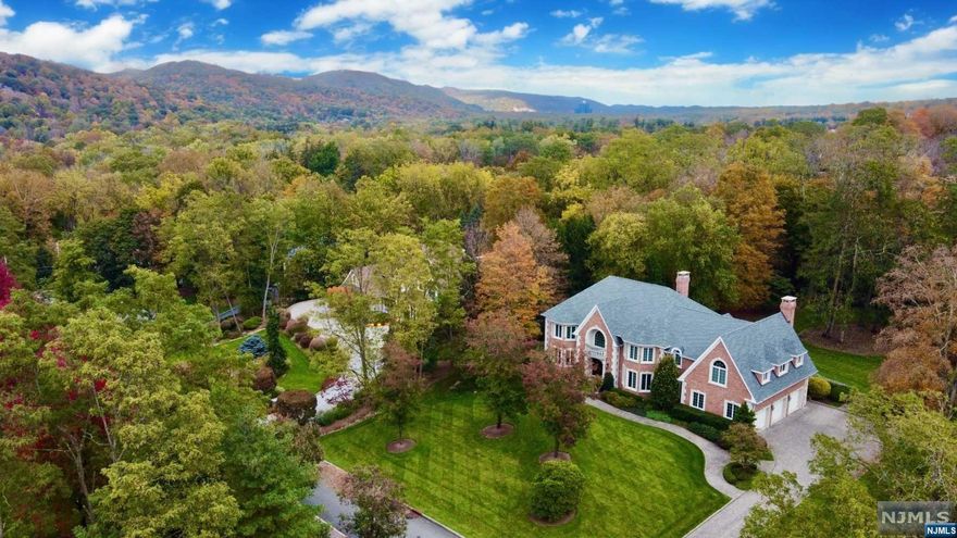 Rio Vista Estates prime cul-de-sac location with mountain views. Custom all brick home with approx. 7600sq.ft. of luxury living. Grand entrance foyer connecting to a formal living room & dining room leads to a 2-story sun-filled great room with a wall of windows, fireplace & built-in wet bar. Elegant cherry office/library. Gourmet kitchen with an oversized center island, breakfast bar & large eating area with vaulted ceiling & skylights, flows to the family room with fireplace. Off the kitchen is a bluestone patio & a private, level backyard. 2 powder rooms & laundry complete the first floor. 2nd level has a lavish primary suite with a trayed ceiling, fabulous new spa bath, a second ensuite bedroom with a new bath, 3 additional bedrooms & another new stunning full bath. Walkout finish lower level with 6th bedroom for guests with full bath, media, game & gym areas. Updates: roof, furnace & hot water heater('18), 3 upstairs bathrooms('21) & freshly painted rooms throughout.