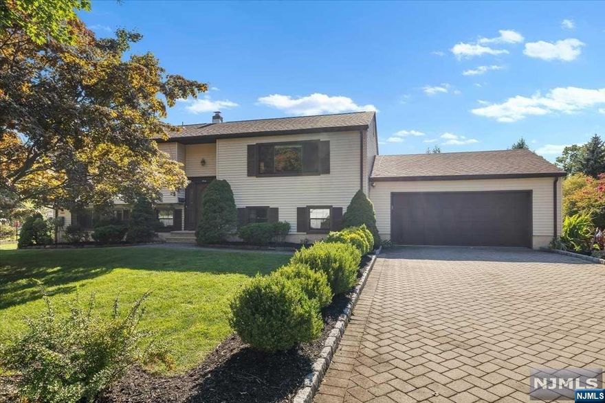 Welcome to this well maintained bi-level home in Harrington Park. This home has 4 bedrooms 3 bathrooms and principal bedroom offers a ensuite bathroom. A skylight in principal bedroom allows you to enjoy the warm sun. You will have two kitchens to prepare great meals for all your guests. The first floor kitchen allows for easy access to the Trex deck and swimming pool. This house offers wood floors under the carpet. The roof is less than 4 years old, all windows are less than 10 years, water filtration system and a whole house generator enhances this home. Don't miss out on this wonderful house and the Harrington Blue Ribbon School system.