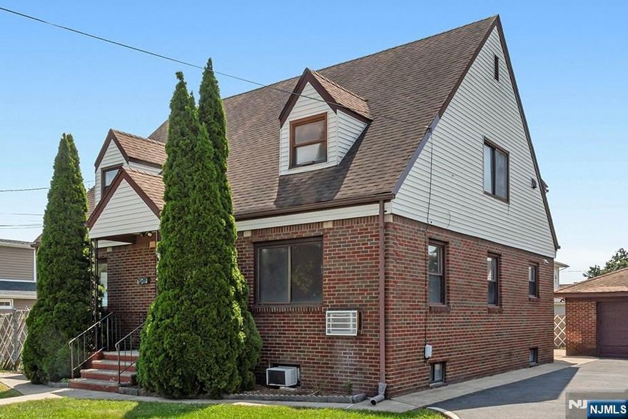 Welcome to 204 Philip Avenue - a beautifully maintained and spacious two-family home nestled in the heart of Elmwood Park. This versatile property is ideal for multi-generational living or smart income potential. The first floor unit greets you with a bright and oversized living room, two spacious bedrooms, a large eat-in kitchen adorned with Corian countertops and ample cabinetry, and access to a covered porch for 3 season enjoyment. The primary bedroom is complete with a walk-in cedar closet. The main bath is updated with full tile finishes and a sliding glass shower door. A large, finished basement expands your living space with a family room, home office or multipurpose room, and area plumbed for wet bar or kitchenette. The second-floor unit offers 2 bedrooms, another eat-in kitchen, and an enclosed porch. Outside, enjoy a long driveway, detached garage, and a large backyard. Additional features include hardwood flooring, recessed lighting, separate utilities, and multi-zone heating. Just minutes from schools, shopping, major transportation, and places of worship, this is the opportunity youâ€™ve been waiting for. Schedule your showing today!