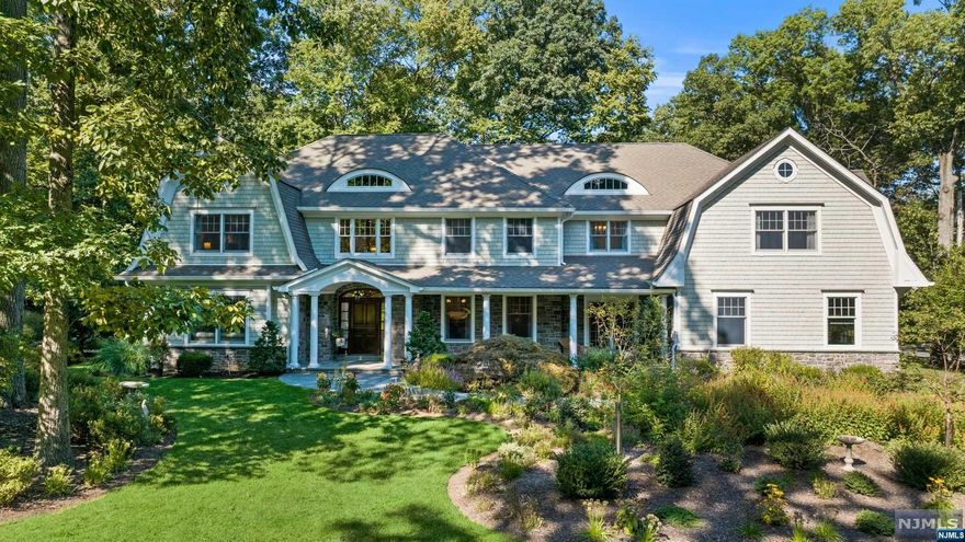 Located in highly-desirable Hartung section of Wyckoff, this meticulously maintained Farmhouse Colonial Manor is situated on .71 acres of lushly landscaped property. Hummingbirds & butterflies abound in a park-like setting. 2-story entry foyer beckons you inside to a sun-lit Living Room. A Butler's Pantry leads to stunning Great Room w/gas fireplace, built-in stereo system w/indoor/outdoor speakers & a wall of French doors opening to a paver patio. The GR opens to a Gourmet Eat-In Kitchen w/granite counters/center island, high-end appliances & walk-in pantry. Dining Room is ready for you to create lasting memories. Here, French doors open to an OFFICE/FR/PLRM. Mudroom & 2 half baths complete the level. Upstairs, indulge in a sumptuous Primary Suite w/vaulted ceiling/2 walk-in closets/elegant Bathroom, 4 generously sized Bedrooms, 2 Full Baths & Laundry RM. Generator, 3 Car Garage, Security, Top-Rated Schools, NYC Trans, Boulder Run Shopping Center & more.