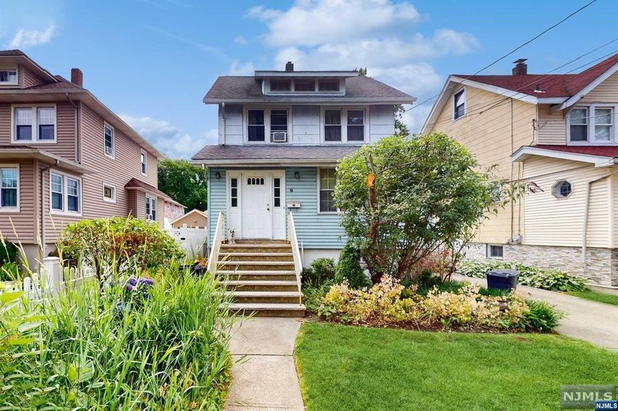 Charming Colonial home boasts three bedrooms and two full baths. The first floor features an open layout with an entry foyer, living room, dining room, and eat-in kitchen. The second floor, offers three bedrooms and a modern full bath. The third floor has a walk-up attic that provides ample storage space. The unfinished basement includes a full bath, laundry room, and new concrete floor with two sump pumps. The living room has two stained glass windows that allow natural light to filter through. The driveway accommodates off-street parking for three cars and a detached garage. The deck leads to a yard, perfect for outdoor activities. This home is conveniently located near NYC transportation and major highways.