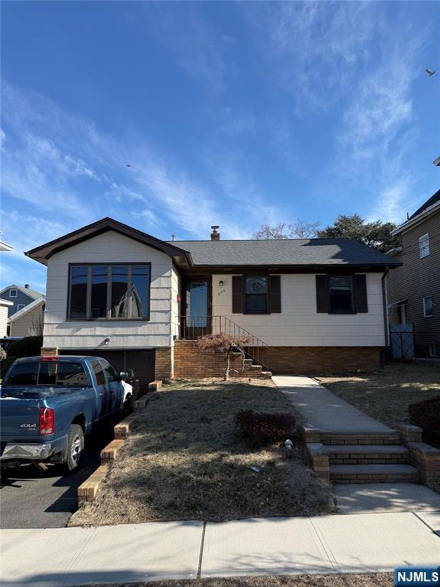 This beautiful house in the heart of East Rutherford offers: 3 bedrooms and 2 full bathrooms Spacious living room perfect for entertainment.Ample closet and storage space. Hardwood floors Fully finished basement with extra room and plenty of storage .A deck and spacious backyard, ideal for relaxation and gatherings ,1 car garage and 1 driveway parking space Close proximity to schools and restaurants, Conveniently located just 1 block from public transportation to New York City Only a 10-minute commute to New York City Potential residents will appreciate the blend of comfort, convenience, and accessibility to urban amenities. Be sure to mention if there are any nearby parks, shops, or other attractions to provide a well-rounded idea of the neighborhood.