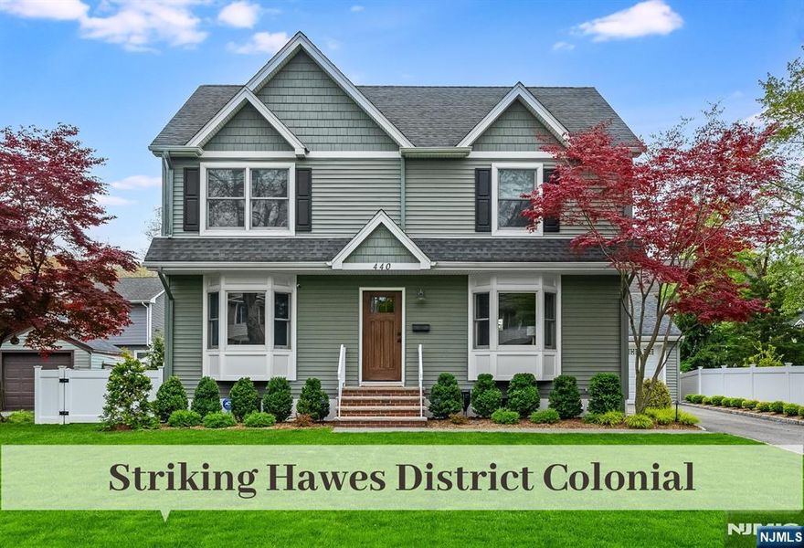 Nestled in quiet, desirable neighborhood, this Stylish Hawes District Center Hall Colonial with Twin Bay Windows offers Sunlit Rooms Throughout and Beautiful Open Flow for Seamless Entertaining. Pride of Ownership is evident at every turn and no detail has been left unattended. Glistening Hardwood Floors, Paneling, Crown Molding and well selected Neutral Palette creates an inviting atmosphere. First Floor provides Classic Staircase flanked by Living Rm & Dining Rm. Kitchen w Stainless Appliances, Bertazzoni Stove, Peninsula Granite Counter, Glass Upper Cabinets transitions to Eat-In Bay. Bedroom or Home Offer has nearby Full Bath for Flexible use. Ascent to the 2nd Fl to find generous Primary Bedroom w EnSuite Bath and WIC w Elfa System. 2 Bedrooms w great Storage, Full Hall Bath and Pull Down Attic Steps complete this floor. Crisp Lower Level offers Rec Rm, Office Space, Storage, Laundry and Backyard access. Outside you will find a Paver Patio, Privacy Planting and Oversized Garage. Pro Landscaping. Almost completely fenced rear yard. Bonus: Moments to Saddle River County Park & Walking Path. 2012 Expansion. Whole House Generator