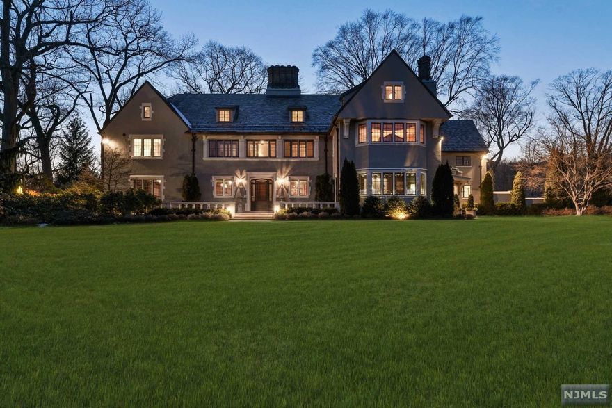 This stately â€œEnglish Manor," offers the perfect combo of luxury & livability 18 mi from NYC! 2.8 acres w/expansive lawns, secluded patios, fieldstone walls, perennial & rose gardens, fountains & outdoor pavilion w/stone FP overlooking heated pool & spa. Recently restored to original Olmstead design. Main residence, designed by Van Vleck & Goldsmith, is bright, grand & welcoming. Chef's Kitchen has expansive counters, gas FP & sep breakfast rm. Library has stunning built-ins, gas FP & flr to ceiling French drs leading to terrace. LR, DR, Sunroom w/gas FPs, Game Rm, Art Rm - so many spaces for living, working & entertaining. Exceptional Primary Suite w/dressing rm, gas FP, soaking tub & marble tile. Charming 3 Bdrm sep Carriage House: Block 01102/0001 & Lot 00032/0003 w/additional taxes of $17,308. Assessment $535,700. 100 x 342 Irregular building lot. Includes heated parking garage, Tesla charging station & gym. Taxes under appeal. See 3D tour, floorplans & video for more detail