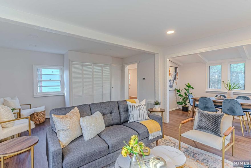 Completely redone from inside, just bring your bags & boxes. Close to everything. Easy bus to NYC. Walk to rainbow lake, very quiet street and neighborhood. One of the safest towns in NJ. Included in sale is the adjacent lot 50x110.