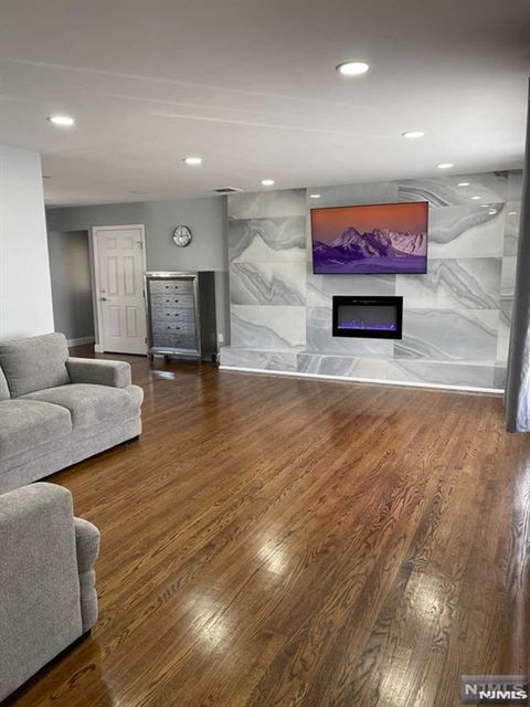 Photo of 1637 Parmelee Ave, Fair Lawn, NJ 07410 (MLS # 26023099)