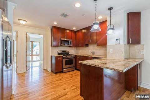 Photo of 17 Meadow RD #307, Rutherford, NJ 07070 (MLS # 26024322)