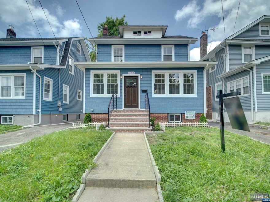 Welcome to this breathtaking, fully gut-renovated single-family colonial home, boasting exceptional beauty and sophistication throughout! with 4 bedrooms and 2.1 bathrooms, A Finished spacious basement with a full bathroom + Washer/dryer hookups. ideal for additional living space or an entertainment area. As you step inside, you'll be greeted by the warm and inviting enclosed porch, and open-concept kitchen, featuring a spacious island with brand-new stainless steel appliances, perfect for entertaining and daily living. The adjacent formal dining room and living room provide ample space for gatherings and social events. The 4 spacious bedrooms offer ample natural light and plenty of storage space. The additional 2.1 bathrooms feature beautiful finishes, ensuring that every member of the household has a comfortable and stylish retreat. The piece de resistance is the fully finished basement, Complete with a full bathroom and walkout access to the beautifully landscaped backyard.