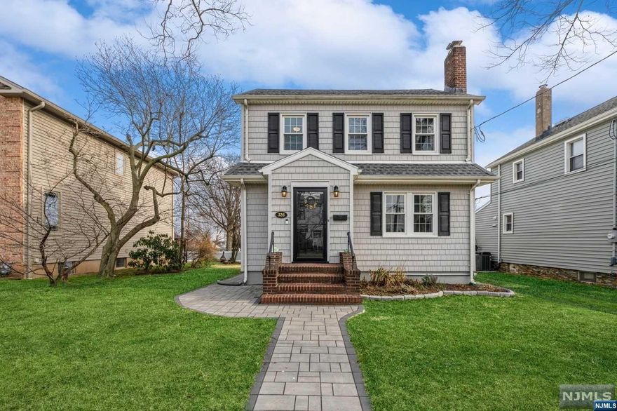 Discover this meticulously maintained 3-bedroom, 1.5-bathroom colonial boasting a two-car detached garage nestled on an oversized lot in a serene dead-end street. The first floor welcomes you with gleaming hardwood floors throughout, a spacious living room featuring a wood-burning fireplace, a formal dining room, and a newer kitchen equipped with wood cabinets, granite counters and stainless steel appliances. Additionally, a convenient laundry room, versatile office space and oversize yard and patio. Upstairs, three bedrooms and a fully updated bathroom, ample closet space and access to a walk-up attic for potential expansion. The basement, accessible via a separate entrance, with high ceilings, a half bath and abundant storage space. Notable upgrades include an updated electric panel, newer furnace, roof and siding. Enjoy captivating views of the NYC skyline from this property, conveniently located near parks, schools, shopping and fine dining.