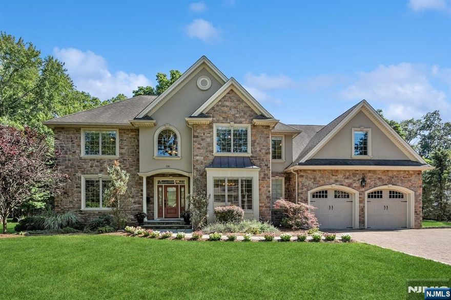 Built 2013, one-owner. Spacious, sun-filled Colonial on a beautifully maintained .75-acre lot (199 x 165) offering over 4,500+ sq ft of living space, not including the fully finished basement. The first floor features a bright and open layout with a grand entry foyer, bedroom and full bath, laundry room, and a gourmet eat-in kitchen with a 43"x95" marble island, stainless steel appliances, and access to the backyard patio through the formal breakfast room. Hardwood, marble floors, and high ceilings throughout add elegance. Upstairs boasts five generously sized bedrooms, including a luxurious primary suite with a spa-like bath, walk-in closet, and a versatile bonus room, plus two additional full baths and attic access. The fully finished basement is dry and carpeted, featuring a bonus room and a large utility roomâ€”perfect for recreation, gym, or storage. The spacious backyard offers potential for a pool or tennis court. Lovingly maintained by original owners with attention to all utilities. Express NYC bus to Port Authority, parks, and schools are just steps away. Move-in ready and like new! Don't miss this one!