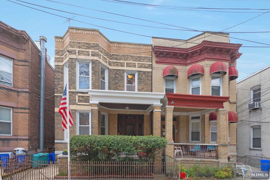 Welcome to this fantastic 2-family home in West New York, steps from Bergenline Ave fantastic shops, restaurants and access to local and or NYC transportation. This home has been lovingly owned by one family for several generations. An inviting front porch welcomes you as you enter through its stained glass vestibule. Gorgeous original woodwork and hardwood floors are throughout both floors. The new homeowner can live in the homes generous rooms on one level and collect market rent on the other. Each floor offers 2-3 bedrooms, living room, dining room , huge eat in kitchen and one bath. Both apartments have separate laundry access. Large unfinished basement with its 1/2 bath has access to the yard and slate patio. Don't miss out on this wonderful opportunity!