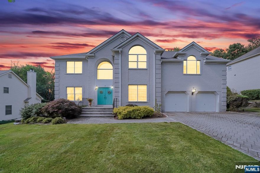 Welcome to 9 Apple Ln, Wayne, a beautifully updated colonial offering space, style, and resort-like amenities! This stunning home features a fully renovated kitchen with a large center island, perfect for entertaining, along with a formal living room, dining room, powder room, and a spacious family room with soaring ceilings and direct access to the deck. Upstairs, you'll find a luxurious primary suite complete with a sitting room and private en-suite bath, plus three additional generously sized bedrooms and a main bathroom. The fully finished walkout basement is an entertainer's dream, boasting a home theater area, recreation space, full bathroom, a bonus room, and a convenient kitchenette. Step outside to your private backyard oasis featuring a beautiful pool, outdoor kitchen, and a charming gazebo, perfect for gatherings or quiet relaxation. Located in a desirable Wayne neighborhood close to schools, shopping, parks, and NY commuting options, this home truly has it all!