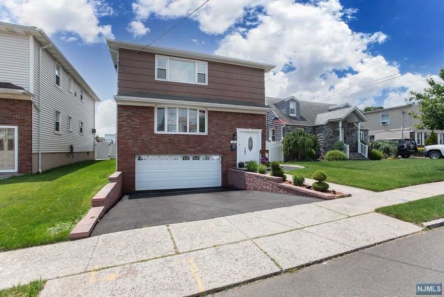 Updated and extremely well kept, this 2 family home features 2 car garage, finished basement, deck, fenced in backyard, and 2 attractive units. First floor offers kitchen with new cabinets and stainless steel appliances, spacious living room/dining room combo, 3 bedrooms and full bathroom. Basement has plenty of space for storage, laundry hook ups included, and another full bath. Second floor has open layout with 2 bedrooms, full bathroom, and laundry as well. This property can offer a ton of flexibility and comes with many upgraded features. Schedule your private showing ASAP! This will not last.