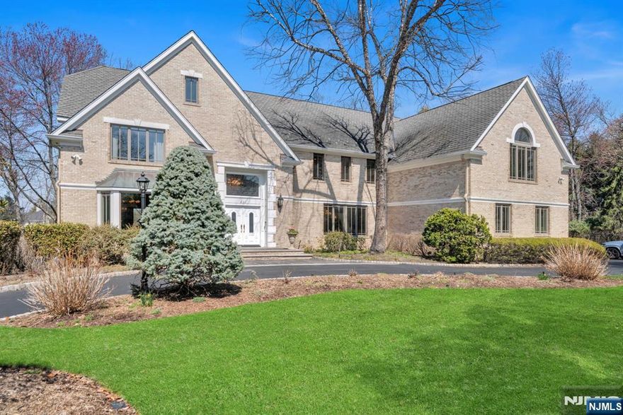 Set on over an acre of manicured grounds in the prestigious High Woods area of Franklin Lakes, this exceptional 5BR, 4.5BA estate offers approx. 6,081 sq ft of elegant living space designed for both everyday comfort and entertaining. A dramatic 2-story foyer opens to a sun-filled 2-story great room, while formal living and banquet-sized dining rooms provide the perfect setting for gatherings. The expansive Ulrich kitchen features dual sinks, dual dishwashers, abundant prep space, and a rear staircase. A first-floor guest bedroom with full bath and laundry room offer flexible living options. Custom millwork throughout highlights the homeâ€™s craftsmanship. Upstairs, the primary suite includes a sitting area, cedar walk-in closets, and a spa-like bath with soaking tub, separate shower, and private water closet. An en-suite bedroom and two additional bedrooms with a dual-entry bath complete the level. Outdoors, a resort-style pool and beautifully landscaped grounds create a private oasis for relaxing and entertaining. A rare opportunity in one of Franklin Lakesâ€™ most sought-after neighborhoods.