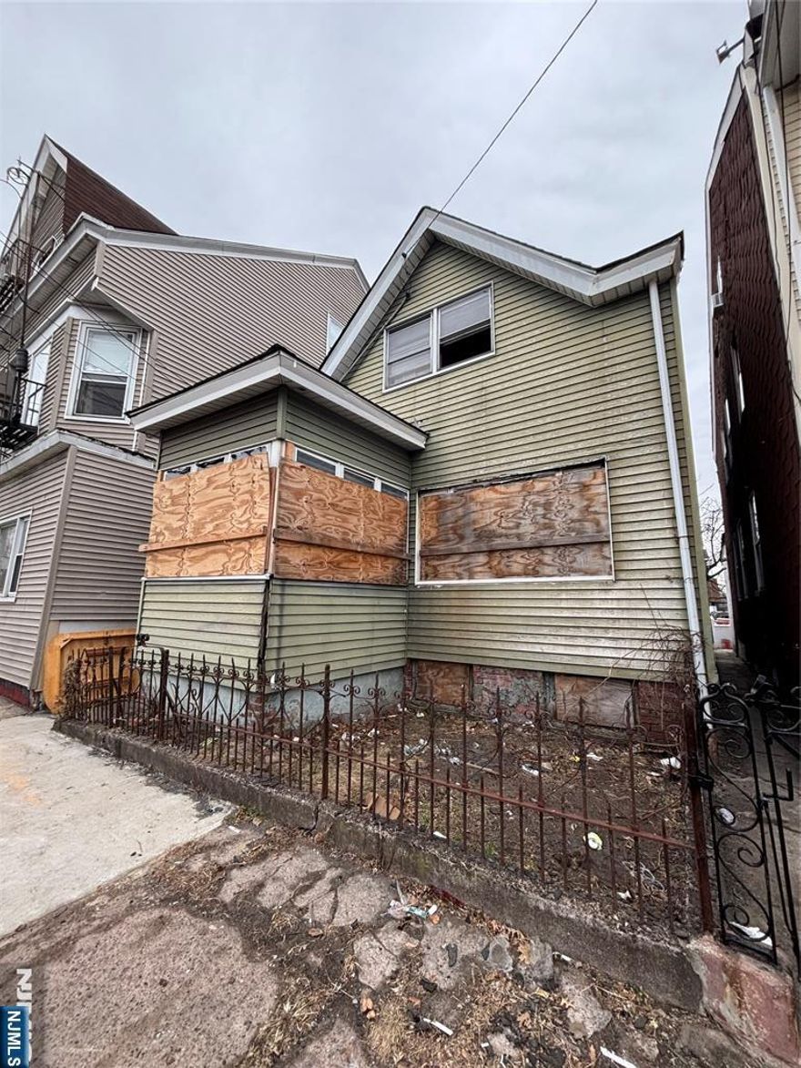 ATTENTION ALL INVESTORS!! CASH ONLY OFFERS / HOUSE VERY DECEIVING. Bigger in the inside than it seems from the outside. 1 family house in need of TOTAL REHAB. On the 1st floor you'll find the living room, eat-in-kitchen 2 bedrooms and a full bath. On the second floor you'll find 2 bedrooms and a full bath. Basement can be finished. NEW ROOF. Buyer responsible for all inspections and CO. PROPERTY BEING SOLD IN AS-IS CONDITION.