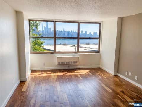 Photo of 7000 JFK Blvd E BLVD, West New York, NJ 07093 (MLS # 26031041)