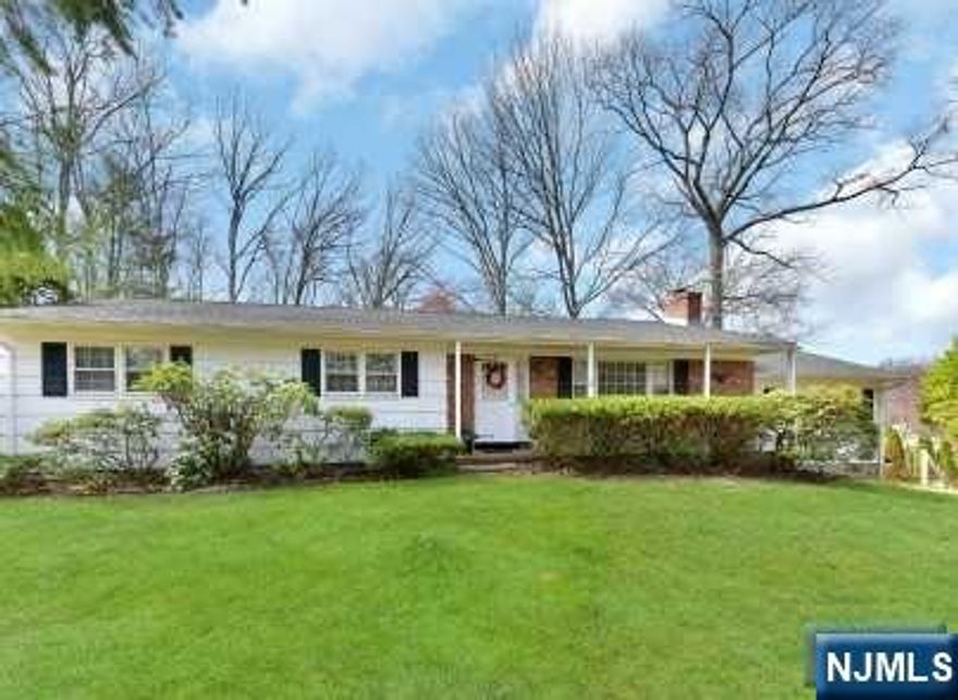 Large, very well maintained 3 BR,2.5 BATH ranch offers large rooms,cul-de-sac location and very close to NYC transit and NJ highways. Great room with fireplace, formal living room with fireplace, three season porch. Hardwood floor throughout, C/A, 2 car garage. In-ground pool sold "As Is"