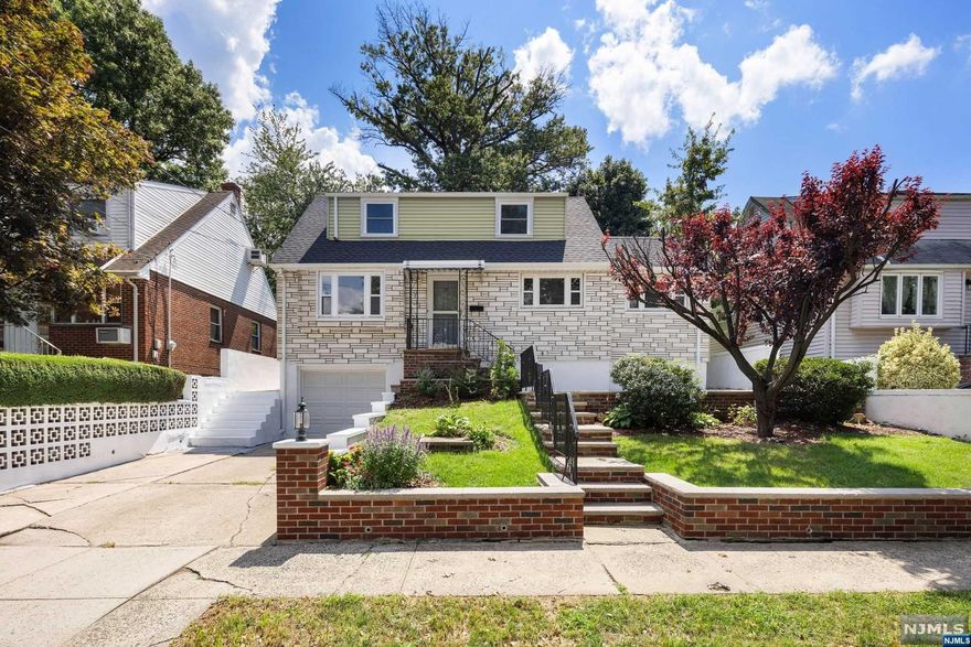 Welcome to 79 Franklin Ave, Fairview, NJ - a charming 4-bedroom, 2-bathroom detached single-family home. This beautifully updated residence features a renovated kitchen with modern appliances, eat-in kitchen, and a formal dining room for gatherings. The main floor includes a primary bedroom, with natural light streaming through bay windows. Enjoy outdoor living in the private front and back yards. The home offers central AC, gas heat, a full basement for storage, and a parking garage. Don't miss the chance to call this gem your home - schedule a viewing today!
