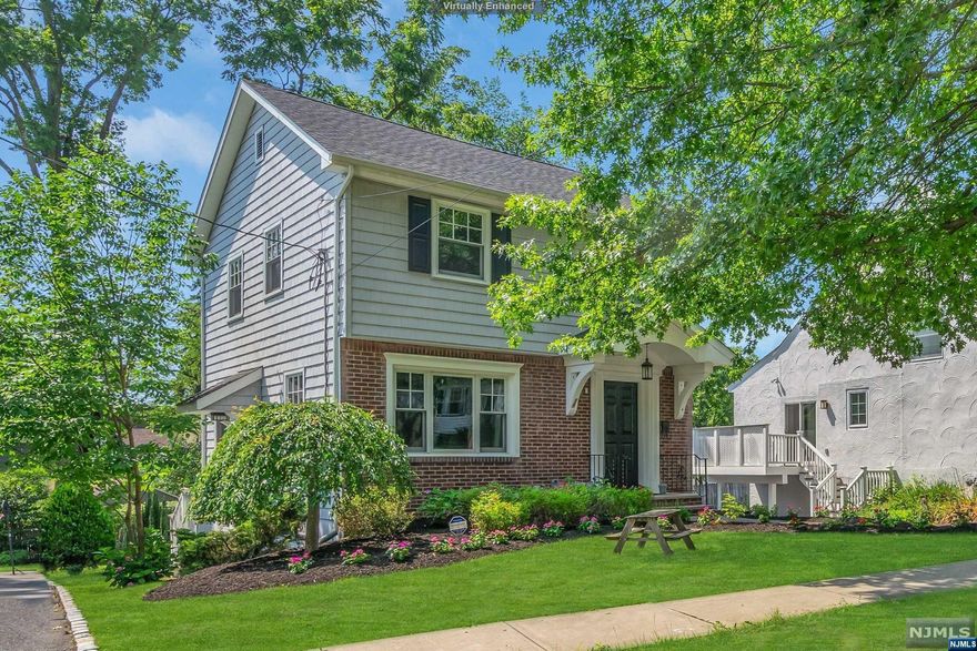 Welcome Home to this immaculate and mint condition home, located on quiet Sunset Drive in Millburn! This lovingly renovated home features 3 bedrooms, spacious dining and living rooms with perfect bay and picture windows, charming kitchen with GE Cafe appliances, all with gorgeous hardwood floors, 2 Renovation Hardware full baths, a fully finished lower level with recessed lighting, great office space/family room, and elegant wall to wall carpeting. Pella windows with skilled craftsmanship and world-class quality make this home even more beautiful, and invite to enjoy nature from inside. 200 amp electric with Generac stand-by generator, built-in garage, extra off street parking, patio and yard. Manicured landscape, good taxes, top-rated schools, near shopping, train and highways.