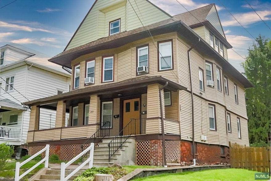 Relax on your beautiful wrap-around porch overlooking a well-manicured street in Passaic Park. Enter through the foyer of this 2-family home into a sizable living room, which leads to a formal dining room, and eat-in-kitchen. Two bedrooms and a full bath complete the first floor unit. Sun pours in through the windows of the second floor unit, which has a similar layout plus an added bonus room, perfect for a home office or exercise room, and a separate kitchen pantry. The walk-up attic will surprise you with 8 foot ceilings and a lot of added space, and huge closets! Beautiful wood doors, 8+ foot ceilings, and brick accents lend character to this century old home. The basement has washer/dryer hookups for both units, separate utilities, and tons of storage. High ceilings create a perfect space for eventual finishing. Convenient to the Passaic train station, buses, parks, and shops. ATTIC BATH IS NOT WORKING. BUYER MUST BE WILLING TO CLOSE WITH A TEMPORARY C OF O.
