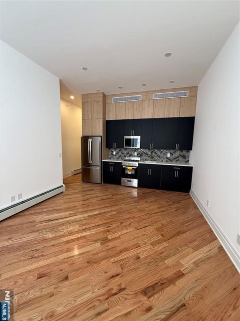 Photo of 695 Elm St #1, Kearny, NJ 07032 (MLS # 26007665)