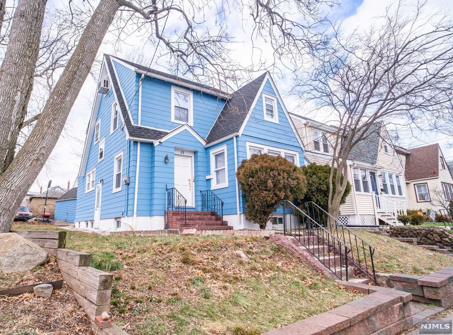 On a quite tree lined street, this gorgeous renovated 3 bedroom 2 bath is everything you have been looking for. Granite counter tops, finished basement with full bath, tons of space and a detached garage THIS IS IT! Come turn this house into a home before someone else does!
