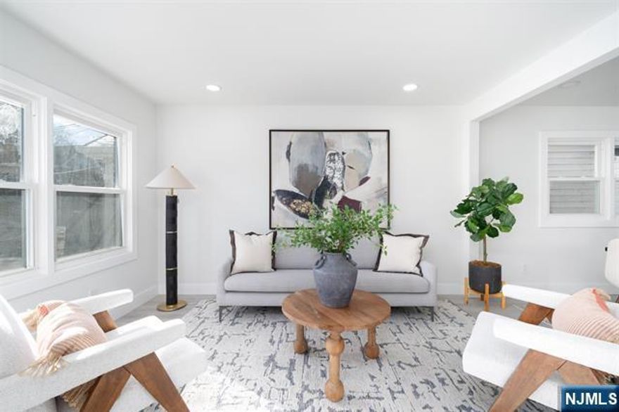 H/B DUE WED 1/15 7PM* This newly renovated multi-family home with an additional bonus unit offering private walk out access is a stunning opportunity for homeowners and investors alike. Drenched in natural sunlight, every unit boasts a thoughtful layout and stylish finishes. - 1st Floor Unit: Open-concept kitchen, dining, and spacious living area, 3 bedrooms, 1 bathroom, and washer/dryer hookup. Heated and cooled by energy-efficient HVAC mini-splits, with a designer kitchen and bath that exude modern luxury. - 2nd Floor Unit: Offers 2 bedrooms, 2 full bathrooms, an open kitchen and living space, plus a private deck for relaxation or entertaining. - Bonus Unit: Accessible through a private entrance at the side or rear of the home, this 1-bedroom unit features a chic kitchen, cozy living area, and easy access to the backyard oasis. Complete with a 1-car garage and driveway, this property combines elegance, practicality, and versatility. Donâ€™t miss the chance to own this light-fill