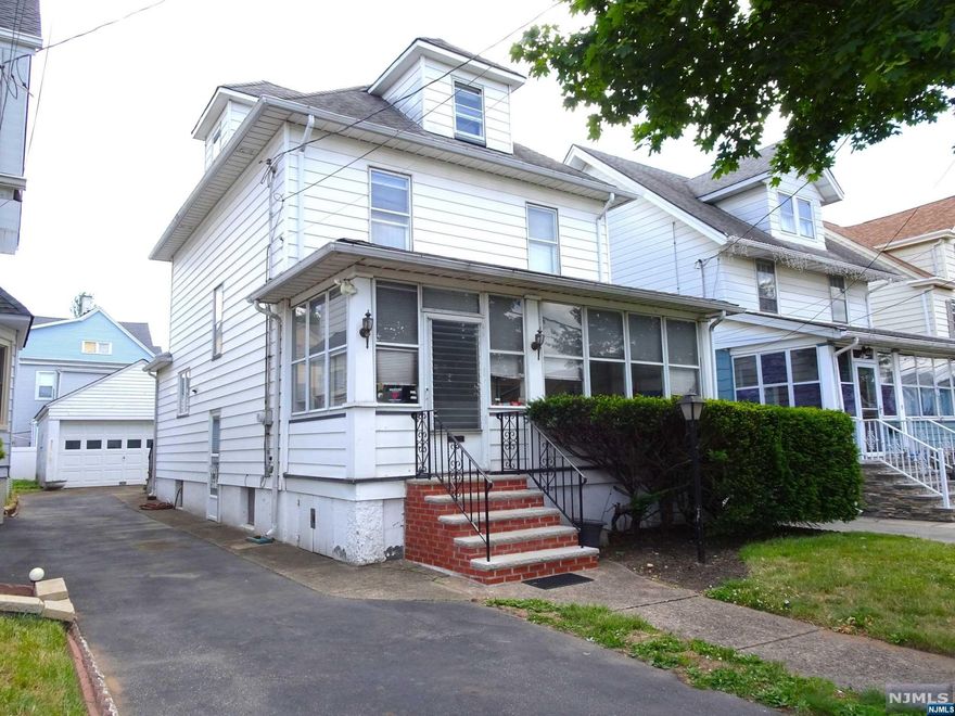 Welcome to this charming Side Hall Colonial that has been meticulously maintained by its long-time owner. Enclosed front porch invites you in. Formal DR w decorative wood ceiling trim is perfect for entertaining guests or enjoying family meals. Spacious EIK features large layout and sliders to yard for indoor-outdoor dining and relaxation. Boasts three bedrooms and one and a half full baths, providing ample space for comfortable living. The multi-zone gas heating system ensures energy efficiency. Newer CAC system ensures comfort during hot summer days. the basement is equipped with a recreation room, providing additional living space for various activities and hobbies. Full walk-up attic offers abundant space that can be utilized for storage or finished to suit your needs. Conveniently located just a short distance to shops, public transportation, and highways. Whether you're running errands, commuting, or exploring the the area, everything you need is within reach. A Must See!