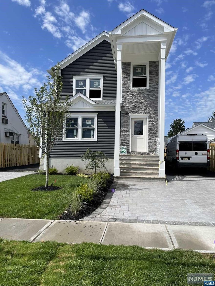 NEW CONSTRUCTION-TWO FAMILY-Six over Six, Two Bathrms each unit.,Seperateheating&air conditioning,Lawn sprinkle systems, Cameras,H/W Flrs.,Paver driveways,low voltage light system for exterior lawn l ights, stackable washer,dryers,microwaves,gas stoves,refrigerators