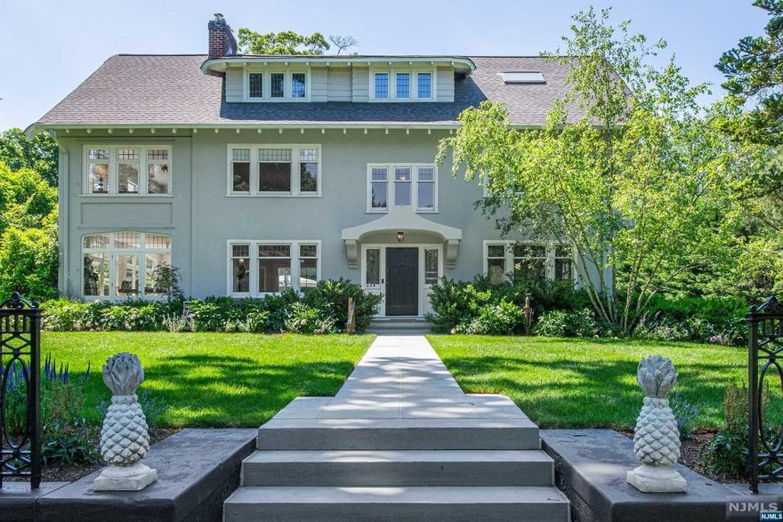 Exquisite Craftsman Colonial with prime in-town location on highly sought after street. Exceptionally designed by RHG Architecture & meticulously renovated by Jack Finn 10 years ago. Modern updates & whimsical custom finishes blend seamlessly w/ gorgeous period architecture throughout. This stunning 5,000+ SF, 6 BR, 4.2 BA home offers an open fl. plan perfect for entertaining w/ 4 levels of expansively scaled rooms.