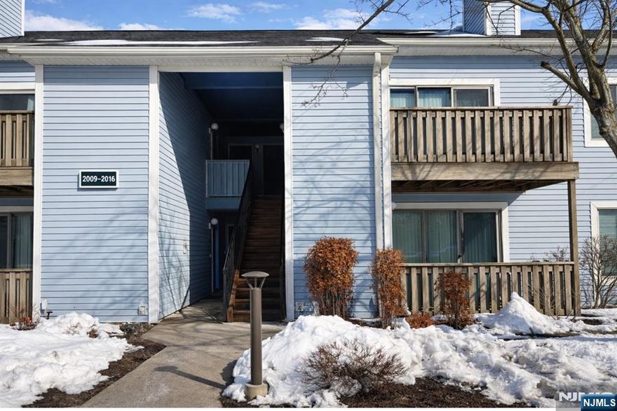 East-facing first-floor condo featuring 2 bedrooms and 2 full baths in the highly sought-after community. This beautiful home offers a spacious living and dining area, shaker-style cabinets, granite countertops, and in-unit washer and dryer. The condo is freshly painted, tastefully decorated, and boasts luxury vinyl flooring throughout. Conveniently located near shopping, restaurants, and the express bus to NYC. A must-see home!