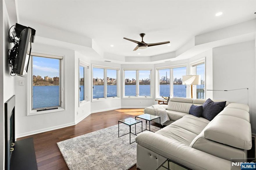 (Contact NELSON CHEN 2 0 1 - 8 8 6 - 8 0 0 0) - Have you been searching for something truly magical? Welcome to PENTHOUSE 4 at JEFFERSON COURT at INDEPENDENCE HARBOR. Perched on the top floor on the front row, in the very best location, this home boasts the absolute best possible Hudson River and Manhattan skyline views that are simply breathtaking. The southeast corner floorplan has 1673-SF inside plus two riverfront terraces that embrace the Hudson. Beautiful enhancements include comprehensive renovations to the kitchen and baths. A gas fireplace, an idyllic setting and 2 garage parking spaces make this a truly special offering. You won't be disappointed. Perfectly located between City Place and Edgewater Commons, Independence Harbor offers 24-hour gatehouse security, swimming pool, tennis courts, clubhouse, resident gym, playground, dog park and acres of property directly on the riverfront - (Presented by THE CHEN AGENCY, 2 0 1 - 3 4 6 - 8 8 8 8, N e l s o n @ C h e n A g e n c y . c o m)