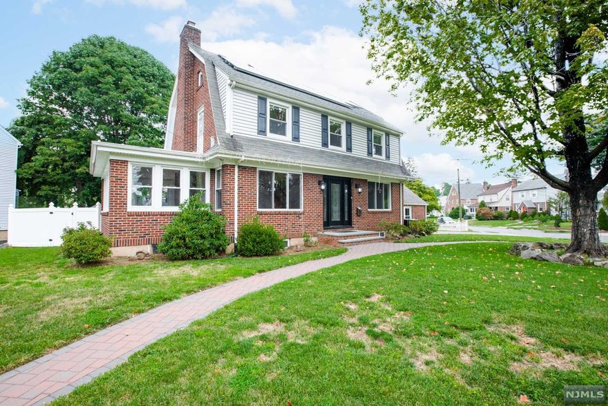 Welcome Home! This robust single family home, situated on a corner lot, in the best neighborhood of Bergenfield NJ. Massive, featuring 4 beds and 4 FULL bathrooms, AND a fully finished basement. Brick facade, large backyard, paid off solar panels, and that's just the outside! Inside is completely renovated with 3 floors of living space. In-law suite in the basement, along with a custom kitchen. This house is a true unicorn with an incredible amount of space. Hardwood floors, renovate bathrooms, and tasteful molding make this home truly move in ready. Be sure to make an appointment before its gone!