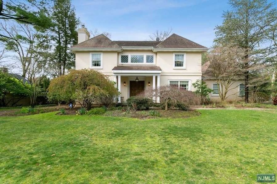 East Hill Colonial. The main level has a gracious entry foyer flanked by a formal Dining Room, Living Room, and Family Room. A spacious Office with doors leading to your putting green.Modern Eat-in Kitchen additional Office/bedroom,Laundry room and mudroom 2 car Garage.This home has every Amenity, hardwood floors.marble countertops in Kitchen, Hi hats throughout, underground sprinklers Large patio access from Kitchen, built in gas range.The second floor Bedroom Suite plus three additional bedrooms . Full Bath Full Finished Lower Level. A must-see Blue ribbon school and a great street.