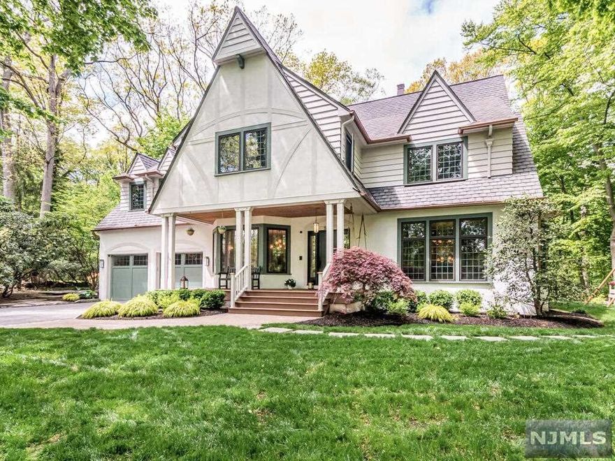 Perfection from top to bottom and nestled in the private park "The Hoo" of Montclair with easy access to NYC trains and busses. Expansive and graceful rooms with four fireplaces, six bedrooms and six full bathrooms. The first floor guest room will charm you, the huge master suite will "wow" you (with vaulted ceilings and heated bathroom floor), and the bedrooms will melt your heart. Viking appliances glisten in this gorgeous kitchen with butler's pantry, wine fridge, Miele coffee maker, and two dishwashers. Feel secure with a whole house generator, french drains, whole house water softener, and attached two car garage that opens right into the kitchen. Lots of room for play in the Great Room, the third floor playroom/gym, and the fully finished basement. A new in-ground plunge pool with deck jets create a dazzling water show. This is where harmony and luxury meet - right in the heart of Upper Montclair.