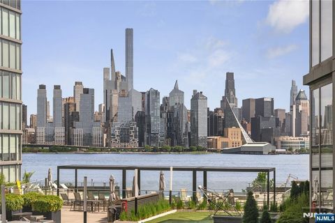 Photo of 9 Ave At Port Imperial #414, West New York, NJ 07093 (MLS # 26018154)