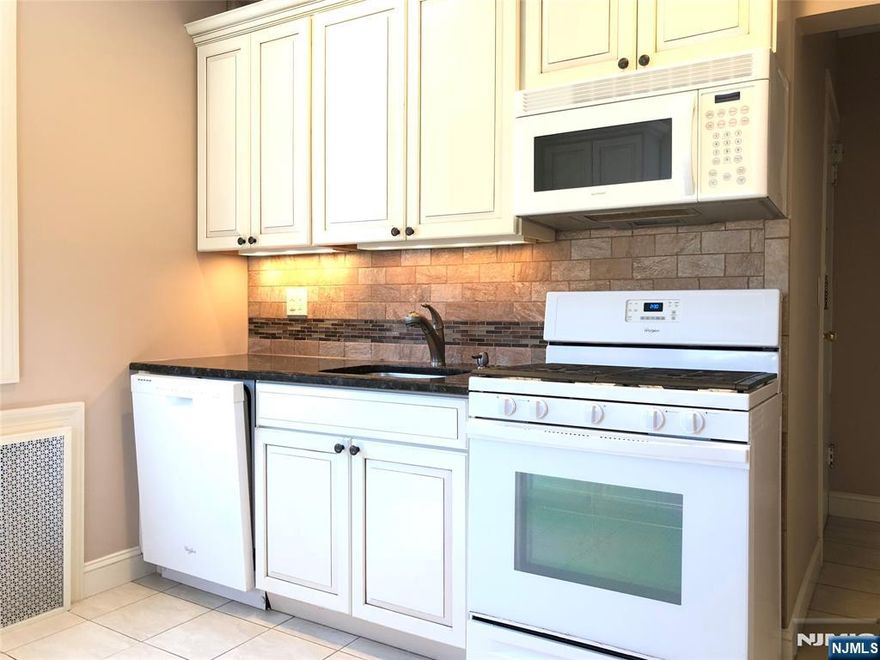WELL MAINTAINED UNIT ON THE 2ND FLOOR OF A 3 FAMILY HOUSE. 2 BEDROOMS, FULL BATH, LIVING ROOM, DINING ROOM AND KITCHEN. COMES WITH YOUR OWN WASHER AND DRYER IN THE BASEMENT AND ONE PARKING SPACE OUTSIDE AND ONE GARAGE PARKING. VERY QUIT STREET FOR ADDITIONAL PARK AND CLOSE TO EVERYTHING. A COMMUTERS DREAM, JUST 1 BLOCK FROM NYC BUS. AT LEASE SIGNING: SECURITY DEPOSIT 1.5 MONTHS RENT, 1ST MONTHS RENT, 1 MONTH BROKER FEE.