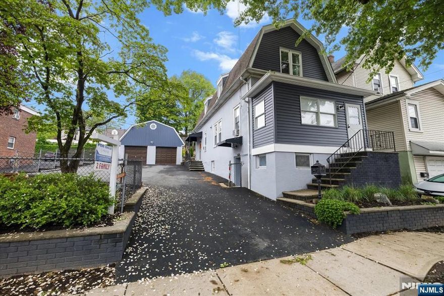 Well maintained Two-Family house with an oversized two car garage and five outdoor parking spaces. First floor unit has been updated with all stainless steel appliances, laminate flooring, in-unit washer/dryer and enclosed front porch was converted into a walk-in closet. Second floor unit has hardwood floors throughout, in-unit washer dryer, lots of natural light and vaulted ceilings. Basement is finished with a full bathroom and separate entrance. Garage has an additional loft space accessed at the rear of garage. Large backyard with a covered patio area and small shed at the very back of the property. Sold as-is.