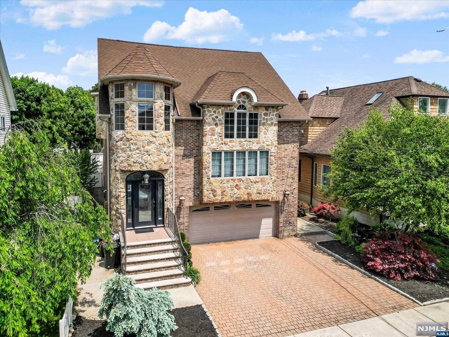 Introducing an extraordinary two-family home that seamlessly blends the advantages of single-family living with the income potential of a dual-unit property. This impeccably designed residence offers a wealth of features to accommodate a modern and versatile lifestyle. The main level boasts an inviting living room, an elegant dining room, a flexible office space or fourth bedroom, and a well-appointed eat-in kitchen. Additionally, a cozy family room with a fireplace provides a warm and welcoming gathering spot.Upstairs, the second floor reveals a luxurious master bedroom complete with walk-in closets and a full en-suite bathroom. Two more spacious bedrooms, an additional full bathroom, and a dedicated laundry room enhance convenience and practicality. Complementing the interior, a two-car garage provides secure parking and extra storage space. Outside, the backyard presents an idyllic setting for entertaining with its in-ground pool, ideal for hosting memorable gatherings.