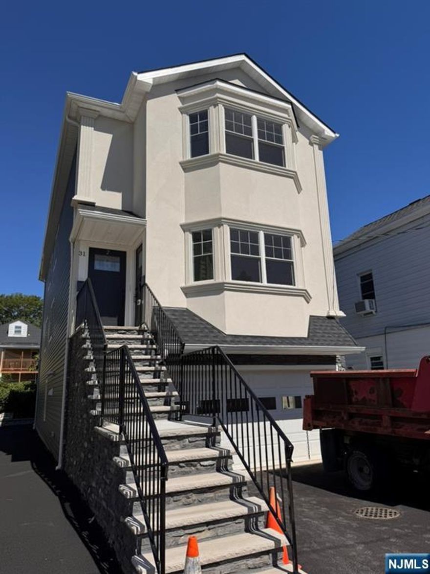 Be the first to live in this brand built, new construction, bright, and spacious 3-bedroom, 2-bathroom apartment on the first floor. It features a large open living room, open concept dining area, and a main bedroom with its own private bathroom. Laundry hookups in the unit (washer and dryer not included). Tenants provide their own refrigerator. The apartment has plenty of closet space and includes one off-street parking spot. Close to shopping, restaurants, and public transportation. Tenant must carry renter's insurance and is responsible for utilities. Landlord pays for water.