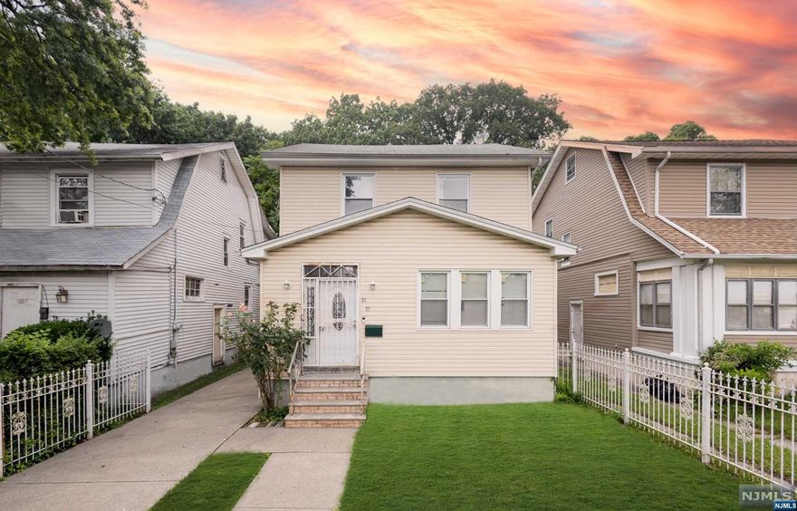 Single family home in desirable section of Newark! Charming colonial house offering 3 bedrooms and 2 full baths with finished attic. The first floor offers a foyer, living room with a den perfect for working from home; followed by a formal dining room and renovated kitchen. The second floor includes 3 bedrooms plus a bonus room perfect for office or nursery, and a full bathroom. Enjoy extra living space in the finished attic. The basement offers a laundry room and a full bathroom for extra convenience. Additional features: private back yard great for entertainment, driveway where you can fit 3+ cars and Central HVAC for Air Conditioning and Heating. LOW TAXES!! Located in a desirable section of Newark by the Vailsburg Park. Schedule your showing today!