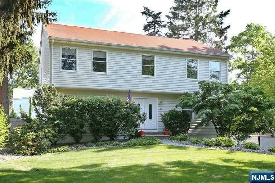 ***FABULOUS CENTER HALL COLONIAL IN THE HEART OF RAMSEY***IDEAL LOCATION*** INVITING ENTRY FOYER-SPACIOUS LIVING ROOM-FORMAL DINING ROOM-LOVELY FAMILY ROOM w/ MARBLE FIREPLACE/ HARDWOOD FLOORS - STUNNING KITCHEN HAS GRANITE COUNTERS/ WHITE CABINETS/ TILED BACKSPLASH/ STAINLESS APPLIANCES/ HARDWOOD FLOORS/ SLIDING DOOR EXITS TO YARD-ROMANTIC PRIMARY BEDROOM w/ LUXURIOUS BATHROOM w/ JETTED JACUZZI TUB/ STALL SHOWER/ TILED FLOOR-THREE MORE GENEROUS BEDROOMS COMPLETE THE 2ND FLOOR- FINISHED BASEMENT- CUSTOM LIGHTING-SLATE WALKWAYS-TWO CAR ATTACHED GARAGE-SHED-NEWER ROOF-NEWER DRIVEWAY-NEWER PRIVACY FENCE-CLOSE TO CENTER OF VIBRANT TOWN/ RESTAURANTS/ TRANSPORTATION/ SHOPPING/ PARKS/ BLUE RIBBON SCHOOLS-LOW TAXES***A-MUST-SEE-HOME!!!*** --