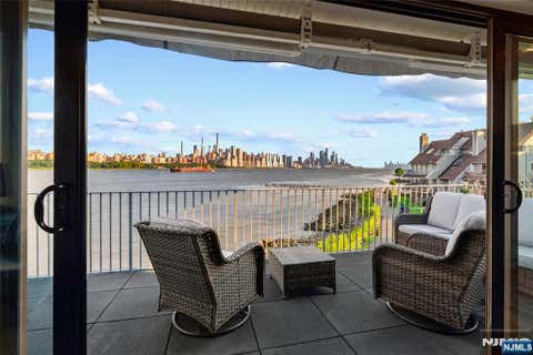 Photo of 4 Cove Lane, North Bergen, NJ 07047 (MLS # 26031134)