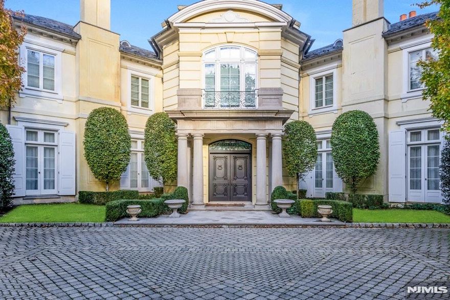 Set in one of Alpineâ€™s most prestigious enclaves just 8 miles north of NYC, this extraordinary 20,000sq.ft. Boris Baranovich designed, Joe DiStaulo built estate embodies refined luxury and grand-scale living. Fully gut-renovated just 3 years ago, the residence seamlessly blends timeless elegance with modern sophistication. The home features 6 expansive family bedroom suites, each thoughtfully designed for comfort and privacy, along with 3 separate staff quarters. Designed for both intimate gatherings and lavish entertaining, the estate boasts 5 impressive public rooms, including a banquet-sized dining room, an elegant living room, and a warm, inviting family room. A standout feature is the spectacular indoor pool complex, housed in its own wing beneath a soaring cathedral ceiling and complete with a water slide for year-round enjoyment. An indoor sports court, 14 seat movie theater, professional gymnasium, playroom and billiards room are all interior recreation spaces. Outdoors, the amenities continue with a beautifully designed pool, a pool house, and a regulation-size tennis court with lighting for evening play. The exterior showcases classic stucco construction topped with a distinguished slate roof, while a gated entrance and sweeping circular driveway provide both privacy and a dramatic sense of arrival. This is a rare opportunity to own a truly exceptional estate in Rio Vista Alpine. Elevator to all levels, four car-garage, and full house generator.