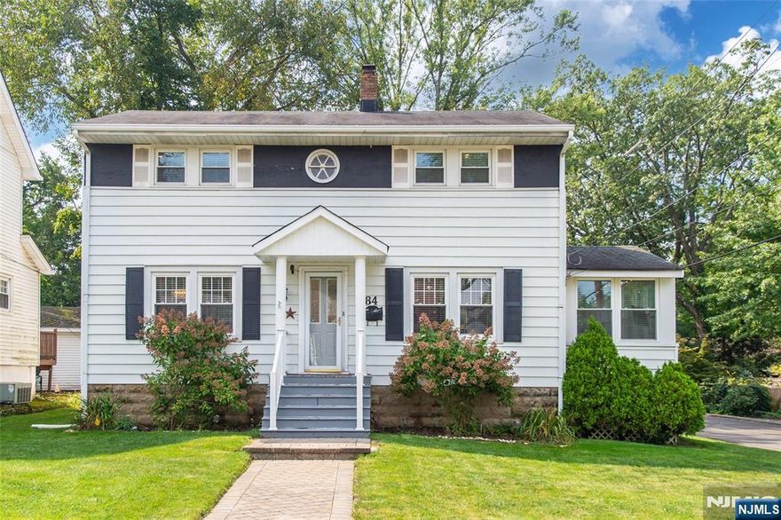 Welcome to this beautifully updated 3-bedroom, 1.5-bathroom colonial in the heart of West Caldwell! With hardwood floors throughout, this home exudes warmth and timeless charm. The modernized kitchen boasts sleek stainless steel appliances, making it perfect for both everyday cooking and entertaining. Flowing seamlessly from the kitchen, the open-concept dining and living areas create a bright and inviting space, complete with a stylish bar area ideal for hosting gatherings and celebrations. A standout feature is the 3-seasons porch, offering a versatile retreat perfect for a play area, home office, or peaceful escape. Upstairs, you'll find 3 spacious bedrooms, including a generous primary suite designed for comfort and relaxation.The basement provides ample storage with a walkout to the backyard, making organization effortless. Just in time for spring, the backyard patio offers the perfect place to unwind, entertain, and enjoy the outdoors. Best of all, you're just a short walk from the shops, restaurants, and all major public transportation of downtown Caldwell!