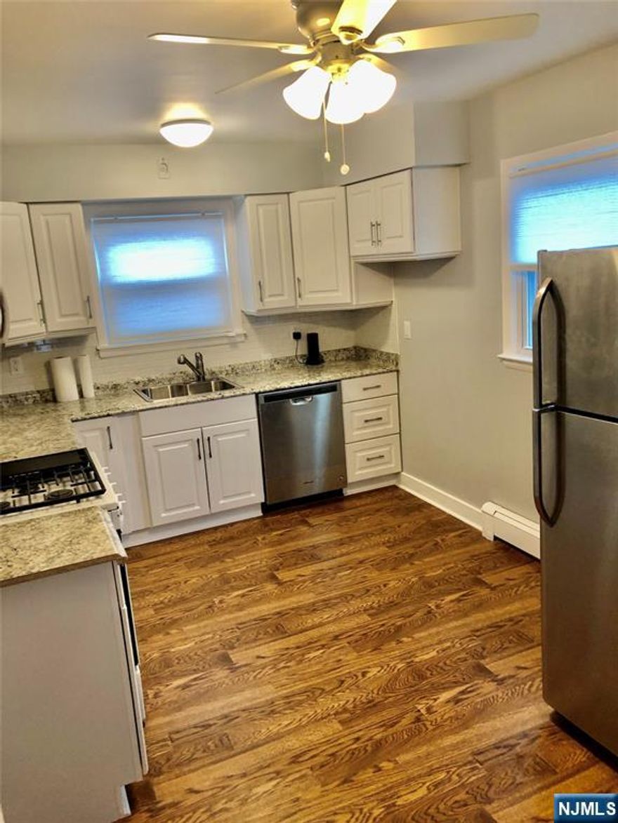 Welcome to this charming first-floor apartment on N Beverwyck Rd, beautifully updated just a couple of years ago! Enjoy a modern kitchen with newer appliances, gleaming hardwood floors, and a bright, comfortable living space that feels like home from the moment you walk in. This unit includes 1 assigned parking spot, plus heat, gas, and water are all included in the affordable rent - offering unbeatable value and convenience. Perfectly located near everything you need in town - transportation, shopping, restaurants, places of worship, schools, parks, and more - this home puts you right in the center of it all.