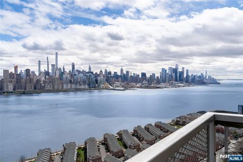 Photo of 6600 Boulevard East #23C-PH, West New York, NJ 07093 (MLS # 25027384)