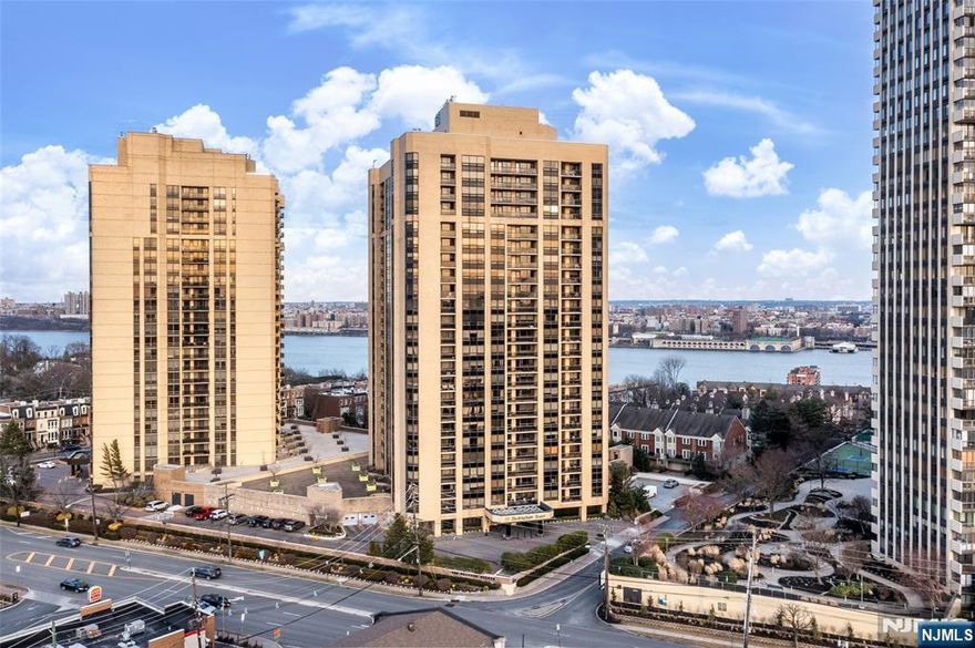 Welcome to Buckingham Tower! This highly coveted, white glove service condominium offers top-tier amenities, including a penthouse entertainment venue, fitness center, sauna, and a rooftop pool. Located on the 18th floor, this large 1 bedroom unit (1,509 sq. ft., including a 129 sq. ft. terrace) boasts an open-concept living and dining area with a sleek, newly renovated kitchen. The large windows throughout the entire unit allow for plenty of natural sunlight and stunning sunset views. The primary suite provides access to a private terrace, a full en-suite bathroom, home-office space, and a walk-in closet. Designated indoor parking space is available for an additional $115/month. EV charging stations on site. NYC Bus directly in front of the building. Maintenance $1,054.48 + Capital reserve $301.39 + Cable $21.00 + Parking $115